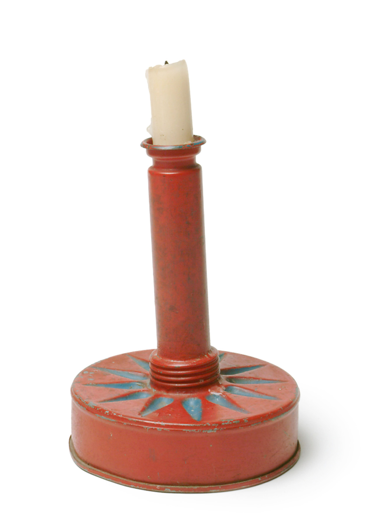 Red candle holder made from a gasmask filtering case
