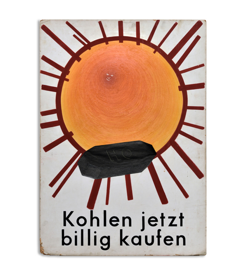 A coal briquette in front of the bright sun, with the words Buy coal cheap now